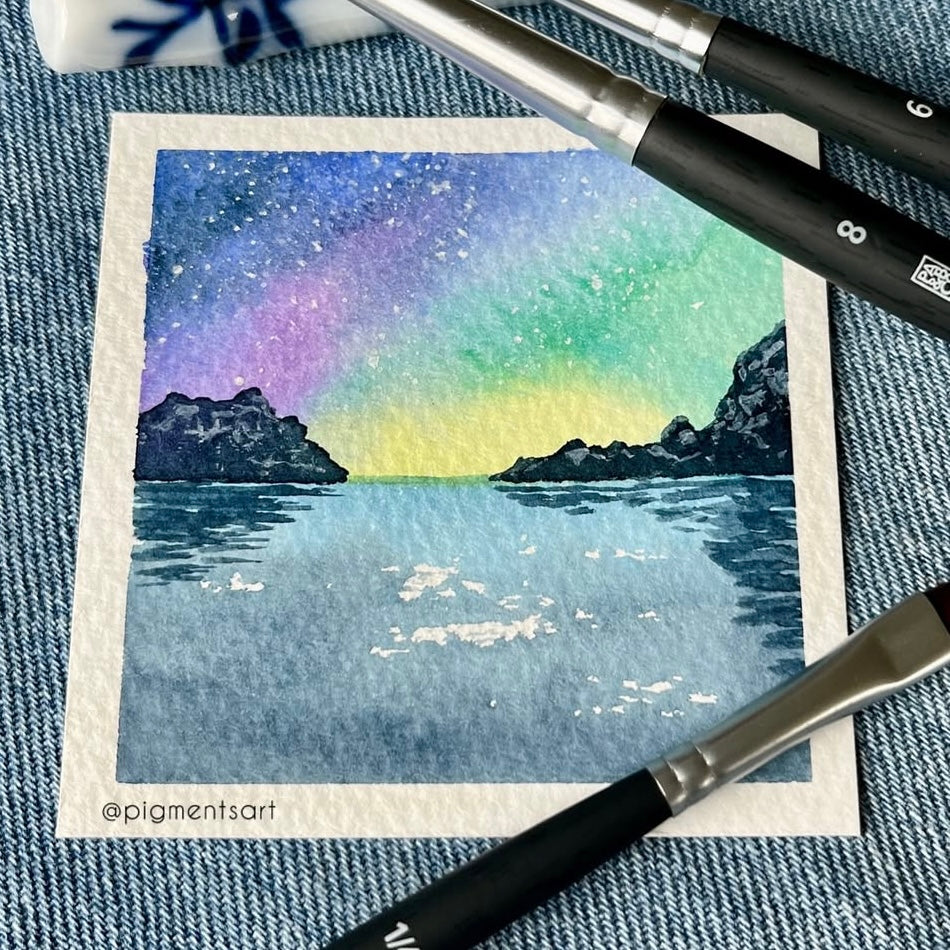 Aurora over still waters